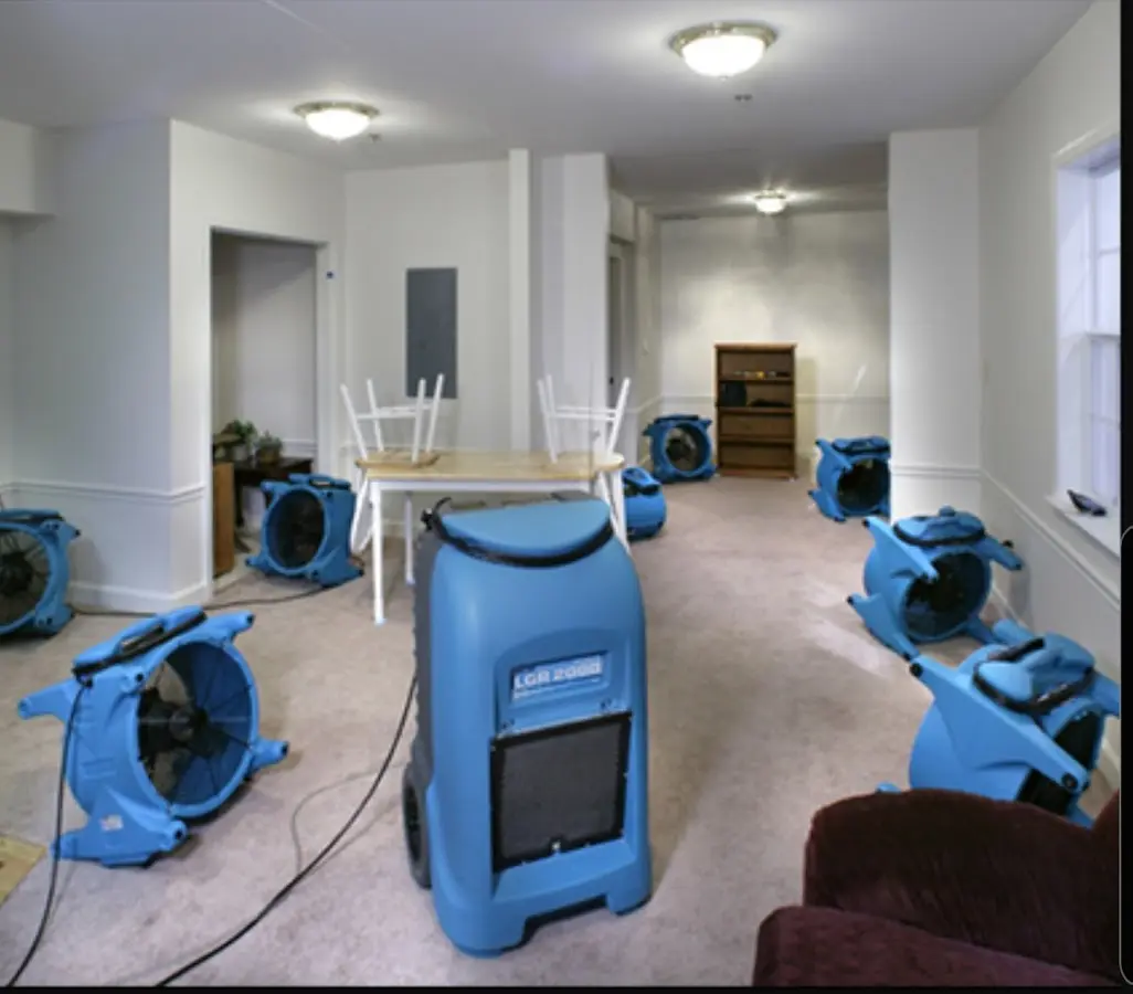 Air movers and dehumidifier setup for Water Extraction & Removal in Addison
